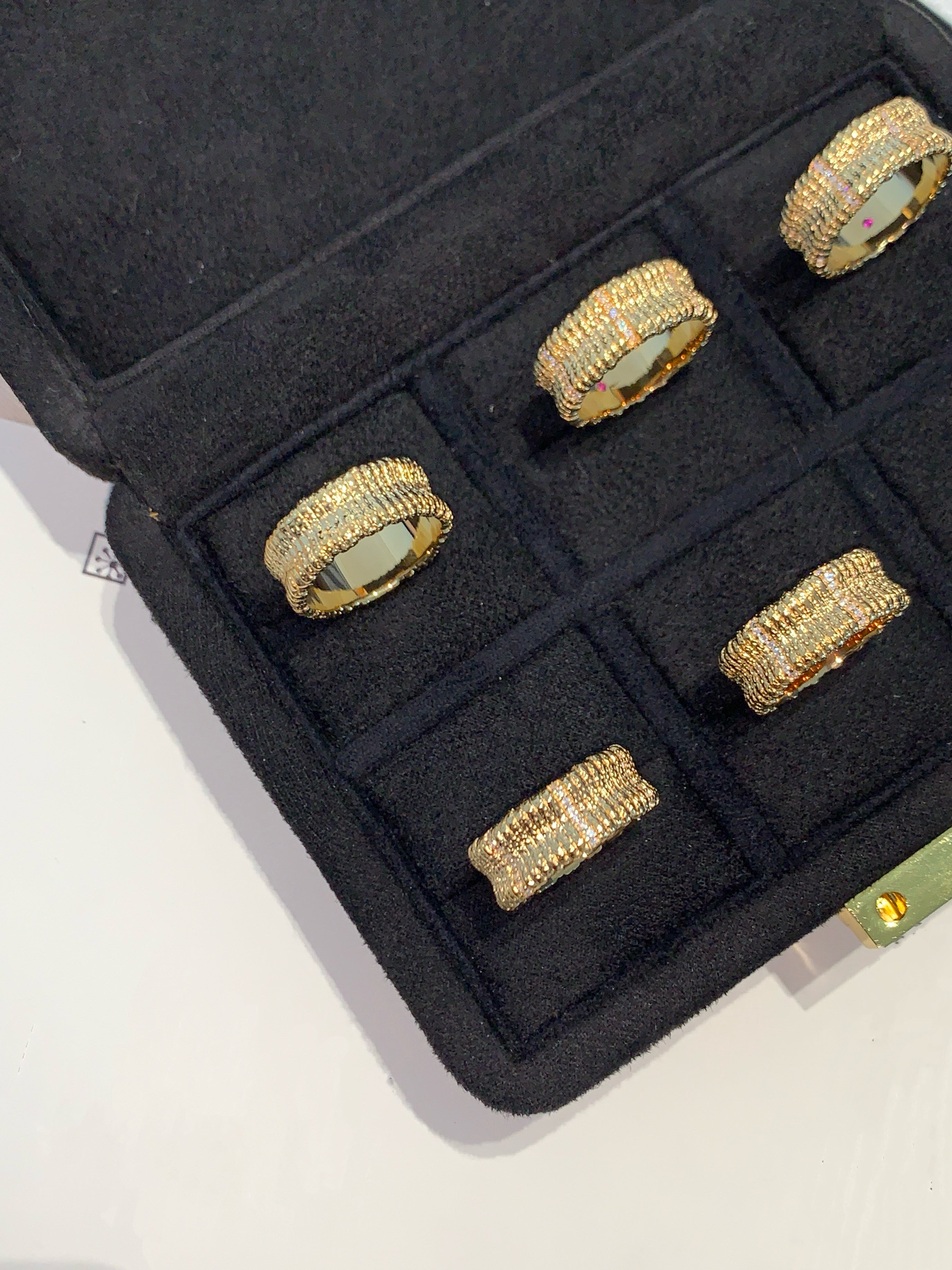 Elysian jewelry 925 silver with 18k plated gold rings in a black jewelry box