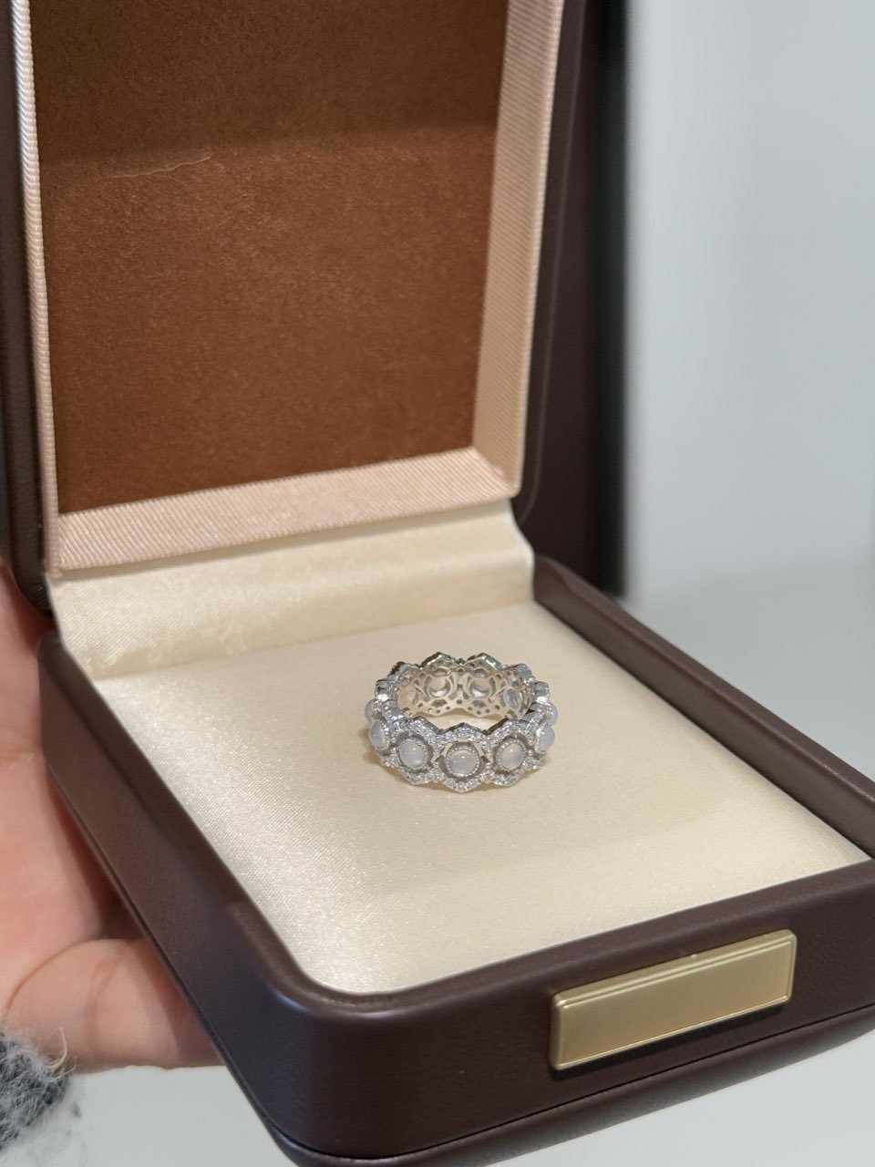 Elysian jewelry 925 silver ring with gemstones in a brown jewelry box