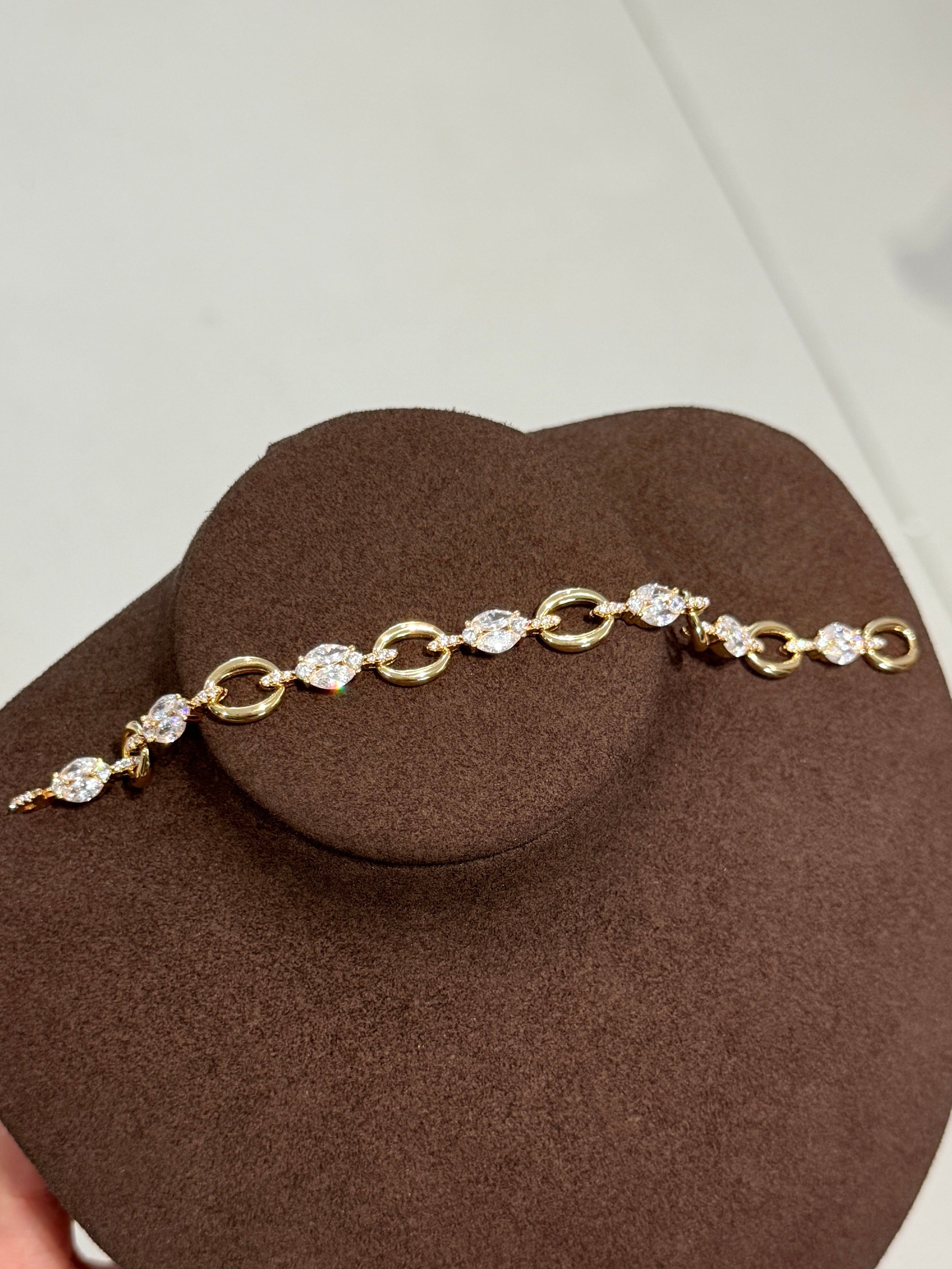 Elysian Jewelry 925 silver with 18k plated gold bracelet with diamonds on a brown model
